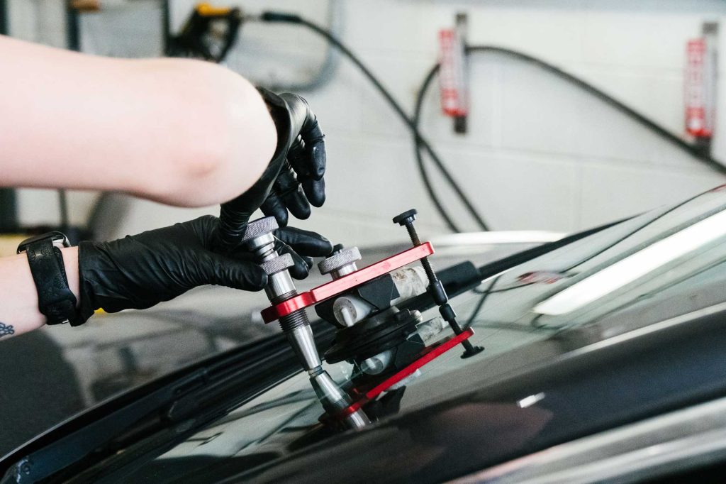 Windshield Repair Expert at Work